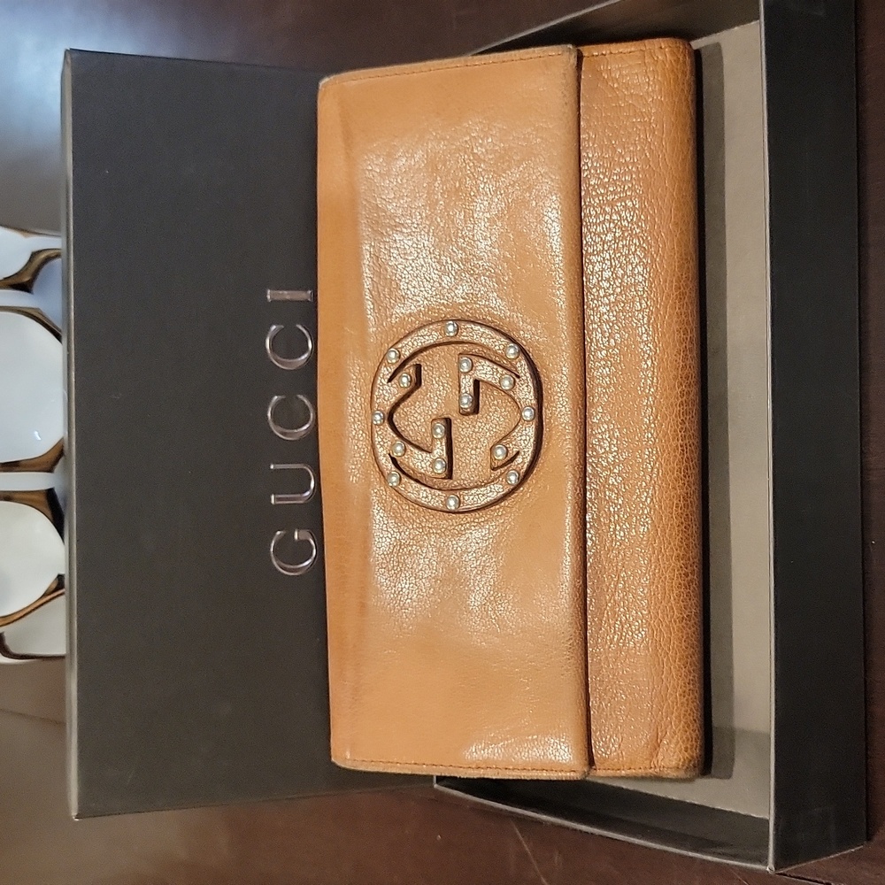 Authentic Gucci wallet with box.